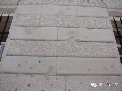 国防部院墙——1918年炸弹留下的坑洼痕迹